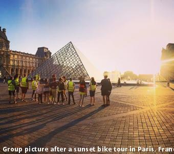 Group picture after a sunset bike tour in Paris, France